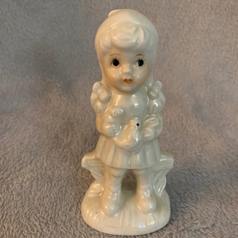 Vintage, 1960’s porcelain girl holding bunnies, 5 inches tall.